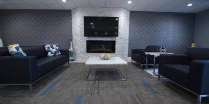 Lobby and coworking lounge at Home Inn & Suites.