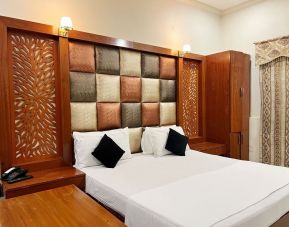 Comfortable delux king room at The Grand Hotel Multan.