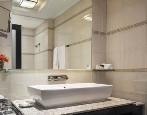 Private guest bathroom with shower at Royalton Park Avenue.