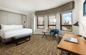 Spacious king room with natural light at Stanford Court San Francisco.