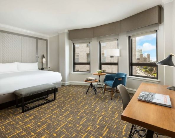 Spacious king room with natural light at Stanford Court San Francisco.