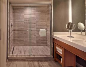 Private guest bathroom with shower at Courtyard Philadelphia City Avenue.