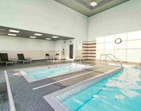 Two indoor pools at Holiday Inn & Suites Calgary Airport North.