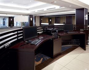 Business center with PC, internet, and printers at Sheraton Montreal Airport Hotel.