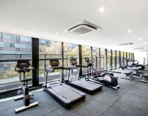 Well equipped fitness center at Vibe Hotel North Sydney.