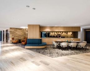 Lounge and coworking space at Vibe Hotel North Sydney.