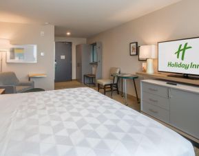 Delux king room with TV at Holiday Inn Edmonton South - Evario Events.