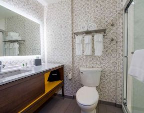 Private guest bathroom with shower at Holiday Inn Edmonton South - Evario Events.