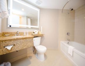 Private guest bathroom with shower and bath combo at Best Western Plus Ottawa/Kanata Hotel & Conf.