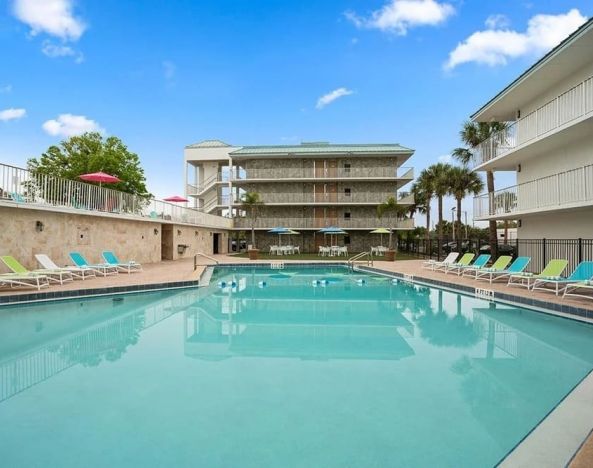 Lovely outdoor pool with pool chairs at Hilton Garden Inn Dallas/Allen.