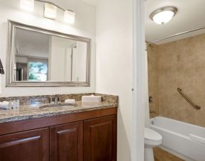 Private guest bathroom with shower at Hilton Garden Inn Shenzhen Baoan Huaide.