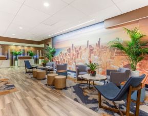 Lobby and coworking space at La Quinta Inn & Suites Chicago Downtown.