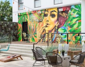 Outdoor patio and coworking space at Hotel Studio Allston.