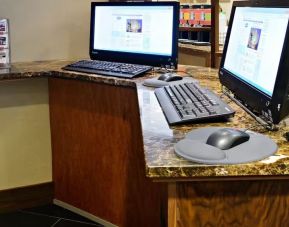 Dedicated business center with PC, internet, and printer at Hampton Inn Manhattan Chelsea.