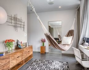 Relaxing day room with hammock and chilled-out workspace at Nu Hotel - Brooklyn.