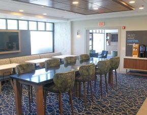 Dining and coworking space at Holiday Inn Express & Suites Boston-Cambridge.