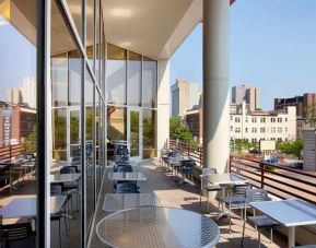 pretty outdoor terrace ideal as a coworking space at Homewood Suites by Hilton University City.