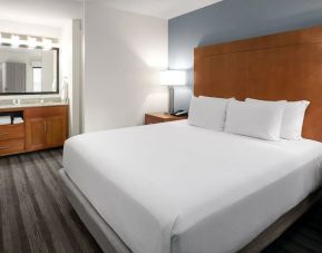 King bedroom with TV at Hyatt House Scottsdale.