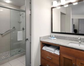 Private guest bathroom with shower at Hyatt House Scottsdale.