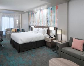 Delux king room with work space and lounge area at Courtyard By Marriott Houston Heights/I-10.