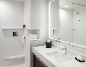 Private guest bathroom with shower at Courtyard By Marriott Houston Heights/I-10.
