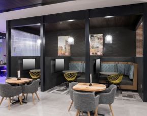 Lounge and coworking space with work pods at Courtyard By Marriott Houston Heights/I-10.