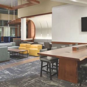 Lobby and coworking lounge at Hyatt Place Portland Airport At Cascade Station.