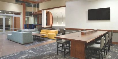 Lobby and coworking lounge at Hyatt Place Portland Airport At Cascade Station.