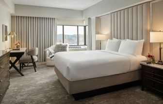 King bedroom with business desk at Capitol Hill Hotel.