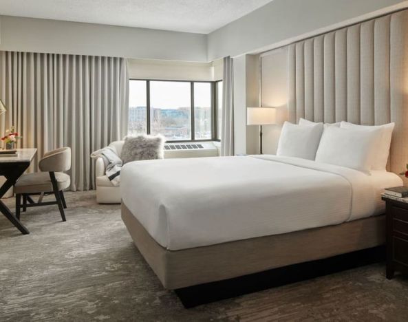 King bedroom with business desk at Capitol Hill Hotel.