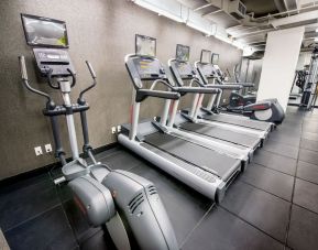 Well equipped fitness center at Beacon Hotel.