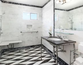 Guest bathroom with shower at Maison 140 Beverly Hills.