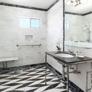 Guest bathroom with shower at Maison 140 Beverly Hills.