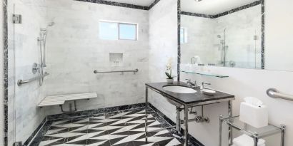 Guest bathroom with shower at Maison 140 Beverly Hills.