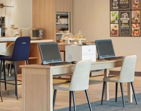 Business center with PC, internet, and printer at Hyatt Place London Heathrow Airport.