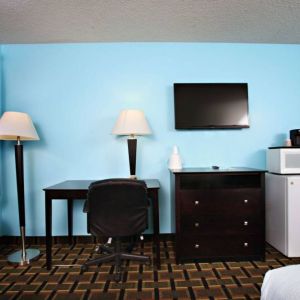 Day use room amenities at Coratel Inn & Suites By Jasper Newton.