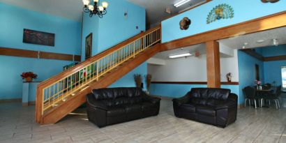 Lobby area at Coratel Inn & Suites By Jasper Newton.
