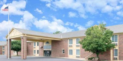 Hotel exterior at Coratel Inn & Suites By Jasper Newton.
