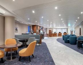 Lounge and coworking space at Hilton Garden Inn London Heathrow Terminals 2 And 3.