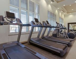 Well equipped fitness center at Embassy Suites By Hilton Savannah.