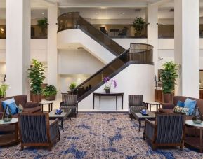 Lounge and coworking space at Embassy Suites By Hilton Santa Clara Silicon Valley.