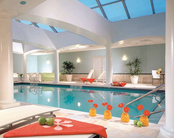 Stunning indoor pool with pool chairs at The Westminster Hotel.