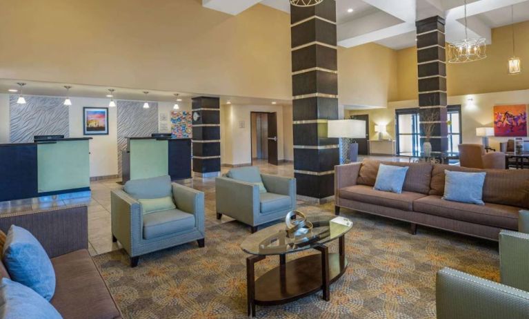 Lobby and coworking lounge at La Quinta Inn & Suites Tucson Reid Park.