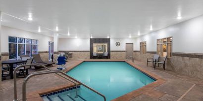 Refreshing indoor pool at AmericInn By Wyndham Sioux Falls North.