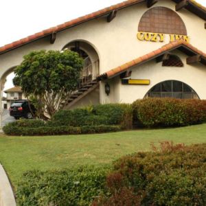 Hotel exterior at Cozy Inn.