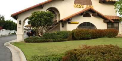 Hotel exterior at Cozy Inn.