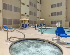 Refreshing seasonal outdoor pool at Comfort Inn & Suites Albuquerque Downtown.