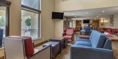 Lobby and coworking lounge at Comfort Inn & Suites Albuquerque Downtown.