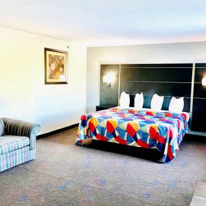 Spacious day use room with natural light at Coratel Inn & Suites By Jasper Northfield.