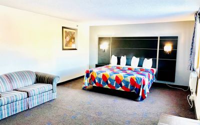 Spacious day use room with natural light at Coratel Inn & Suites By Jasper Northfield.